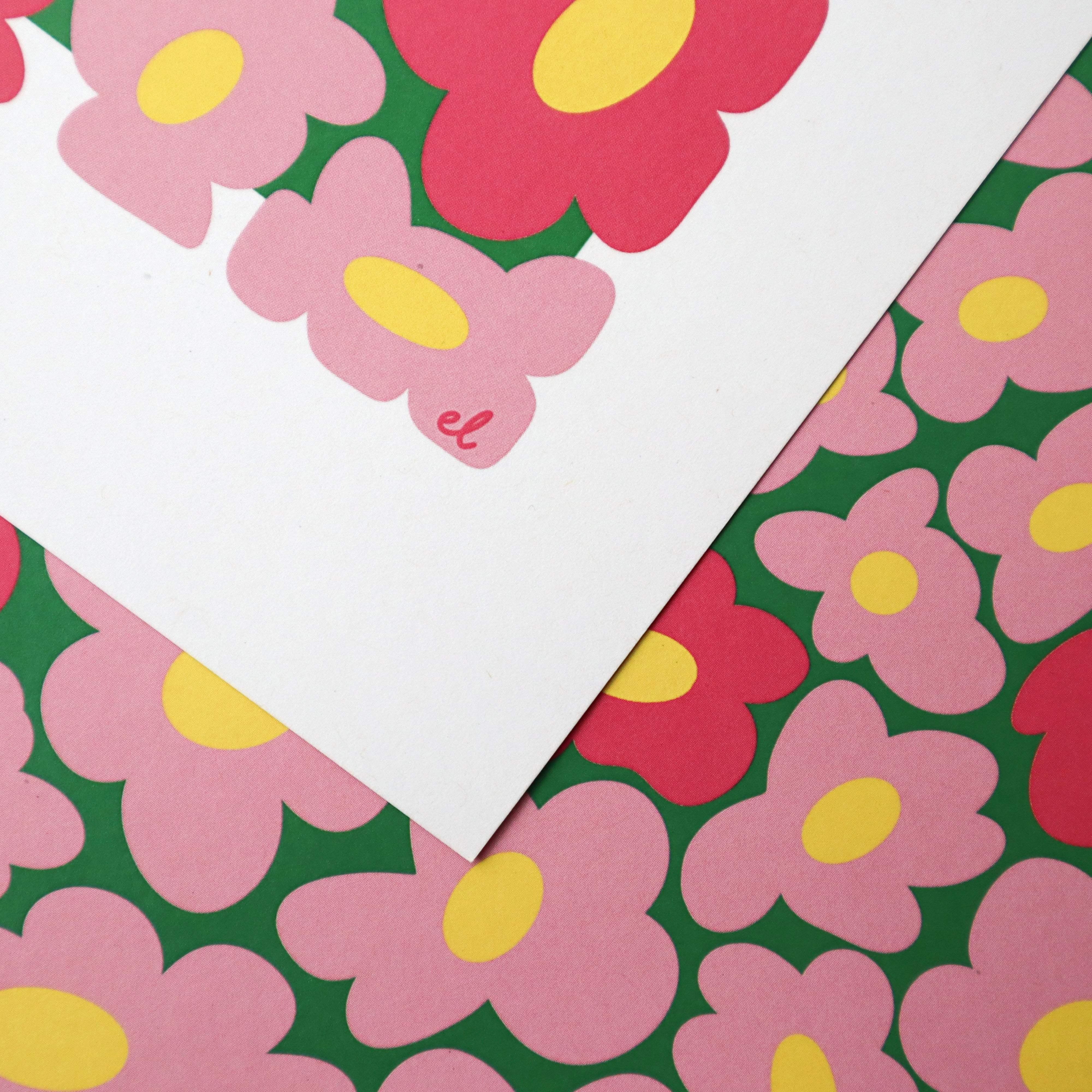 A printed artwork featuring a whimsical pattern of wobbly pink daisies