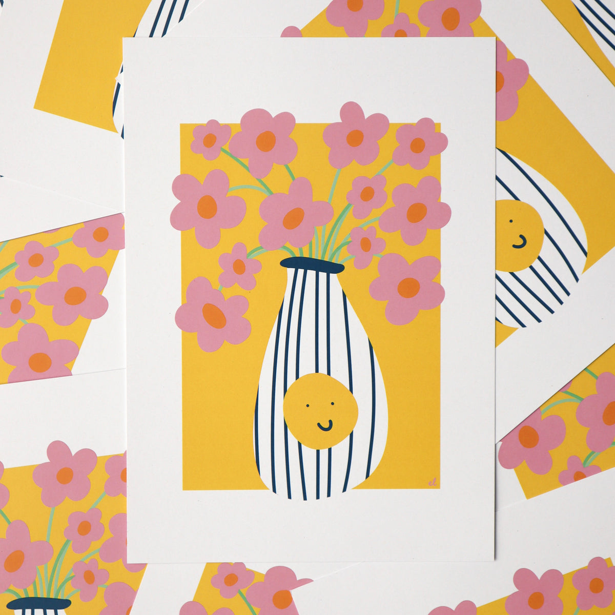 Colourful art prints, print shows a striped vase with a yellow smiley face, full of pink daisies on a yellow background