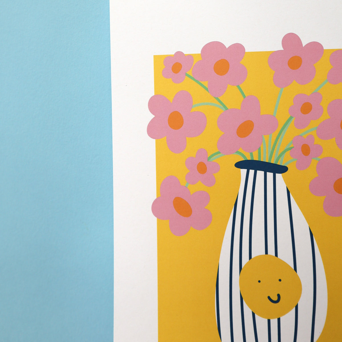 A colourful artwork depicting a vase with a smiley face full of pink daisies, on a blue background